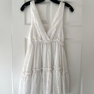 white v neck ruffle mini dress